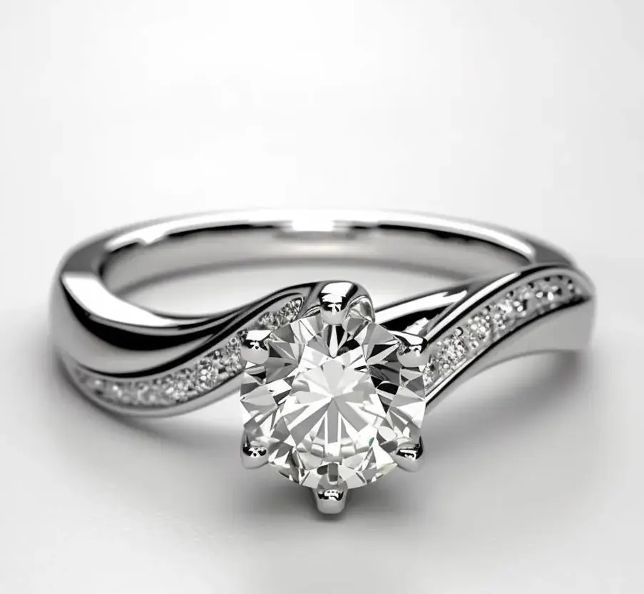 A white-gold bypass engagement ring with a round solitaire and pavé shoulder.
