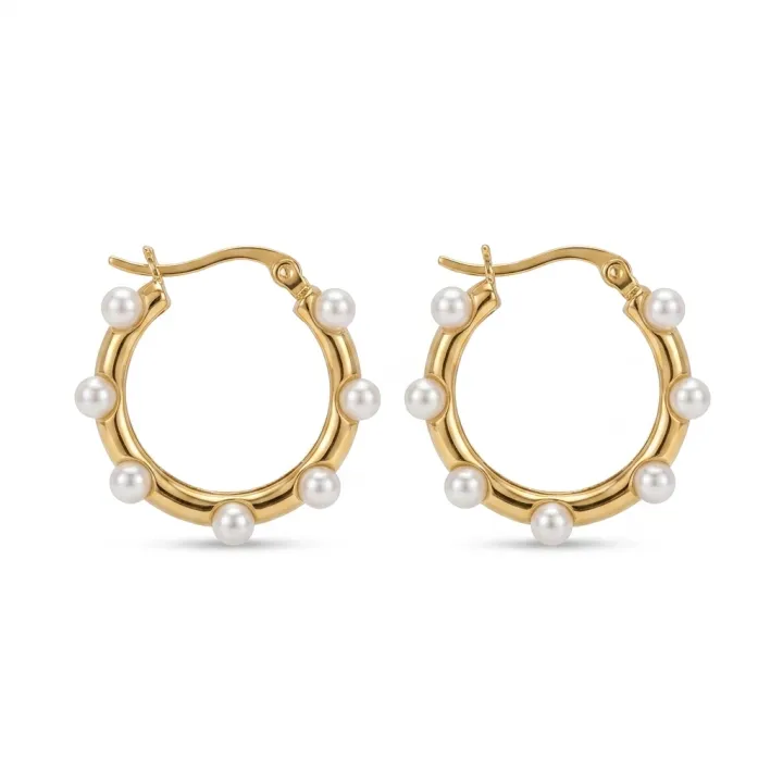 A jewellery packshot lit evenly on a seamless white background.