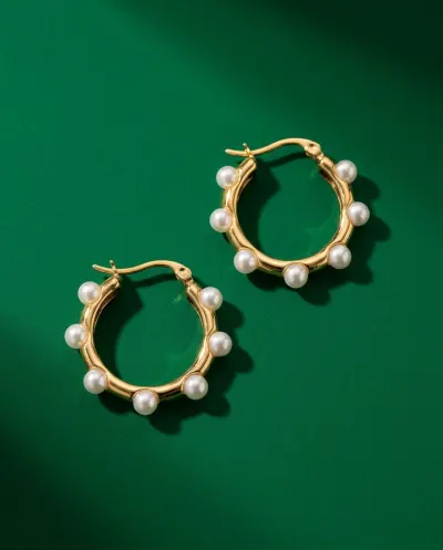 Jewellery photographed against a saturated colour background.
