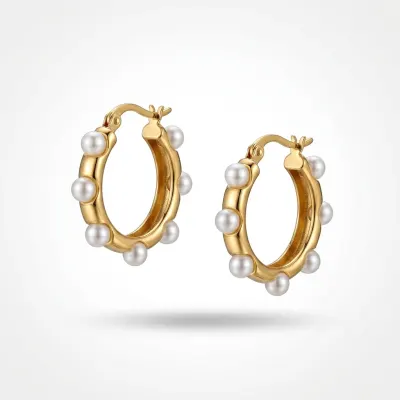 A jewellery piece photographed floating against white.